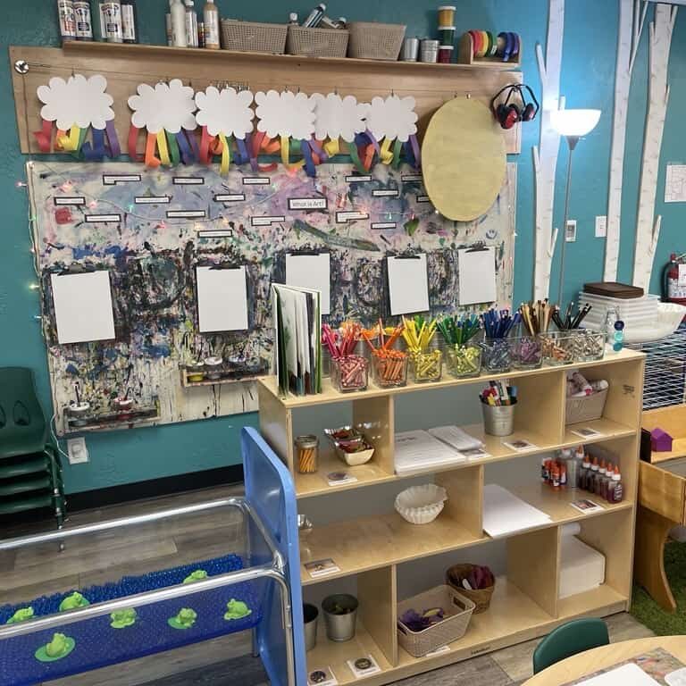 This image shows a colorful display of school supplies in a preschool classroom.